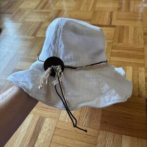 vintage wire brim linen bucket hat with wooden button and string/lace detail